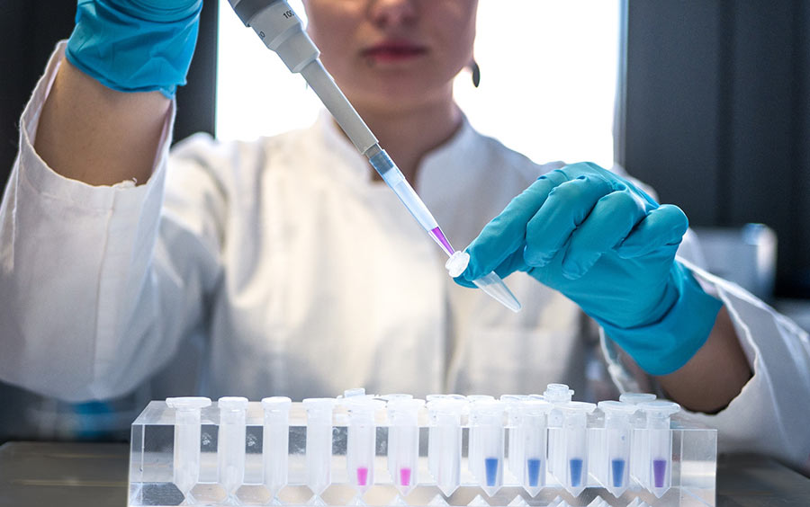 Process technician holding a test tube Process Technician